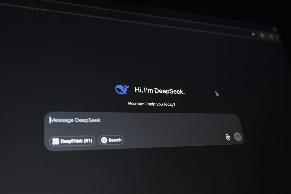 Close-up of a digital assistant interface on a dark screen, showcasing AI technology communication, DeepSeek, DeepSeek-V3, web scraping, AI data extraction, open-source LLM, web automation, scrape websites, lead generation tools, DeepSeek tutorial, Labiz Insights, smart business tools, data scraping tutorial, extract website data, AI tools for marketers, DeepSeek web scraping, automate data collection, LLM scraping, GPT-4 alternative, data automation, scraping with DeepSeek